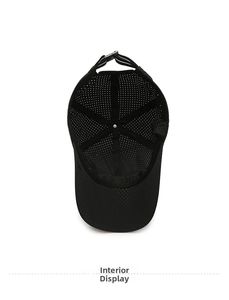 Detailed interior view of black quick-dry polyester baseball cap with mesh structure