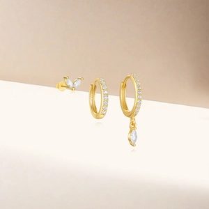Macro detail of gold plated S925 sterling silver evil eye earring set with zircon