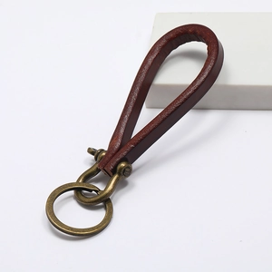 Handmade vintage dark brown leather keychain with retro bronze horseshoe buckle