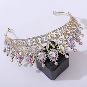Detail of golden Baroque bridal crown featuring luxury AB rhinestones and pear-shaped drops