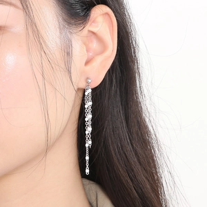 Long silver tassel earrings with layered chains and sparkling sequins for women