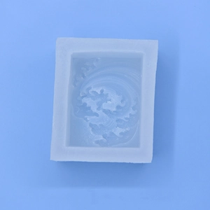 Translucent rectangular silicone mold with detailed ocean wave texture for DIY crafts