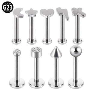 9-piece set of G23 titanium studs featuring lightning, heart, and cross designs