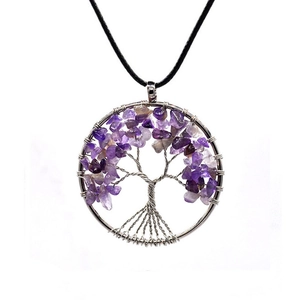 Detail of amethyst chips hand-wrapped in silver wire tree of life pendant design