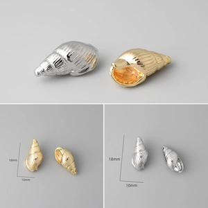 Detailed view of 18k gold and silver conch shell charms for DIY jewelry 18mm x 10mm