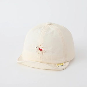 Detail of embroidered animal motif and soft brim on beige quick-dry baby sun hat