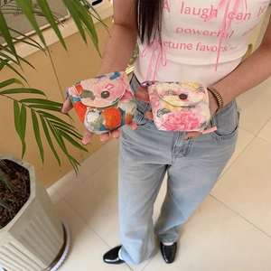 Mini floral storage pouch with metal snap button and strap for feminine products