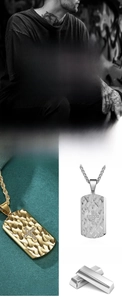 Detailed macro view of titanium steel military dog tag pendant with diamond cross inlay