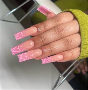 Long square press-on nails with pink gradient and heart star patterns for women