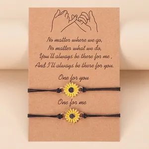 Handmade woven sunflower charm bracelets for couples on a sentimental gift card