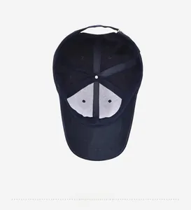 Detailed interior view of a navy blue baseball cap showing seams and sweatband