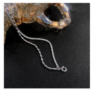 Detailed close-up of 925 silver plated double layer bracelet with shimmering beads