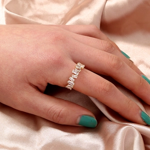 Adjustable gold plated safety pin ring with rectangular cubic zirconia on satin fabric