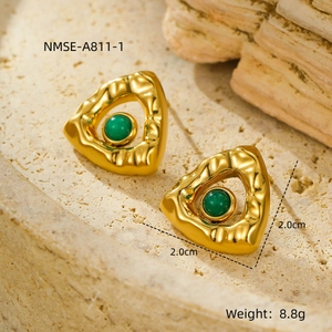 Macro shot of 2.0cm gold-plated triangle earrings with green stone and ripple texture