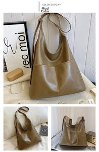 Detailed macro view of khaki green matte PU leather hobo bag with adjustable wide strap