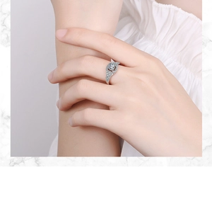 Elegant model shot showing the shiny cubic zirconia ring with an adjustable silver band