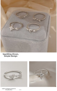 Macro detail of S925 sterling silver rings with bow and star zircon inlay