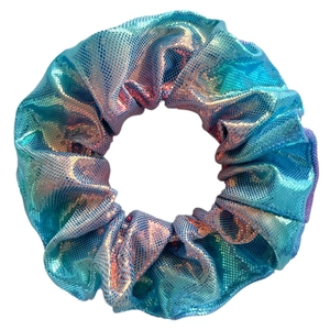 Detailed view of large hair scrunchie with blue-green laser gradient fabric texture