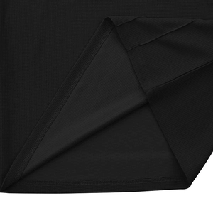 Detailed macro view of black honeycomb knit fabric texture and durable hem stitching