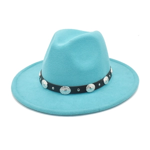 Detail of turquoise wool fedora featuring a black leather band with silver metal buckles
