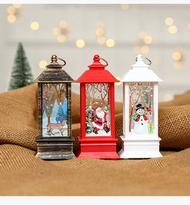 Three festive Christmas LED lanterns in black, red and white with holiday patterns