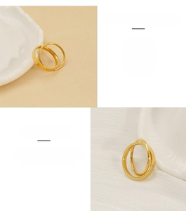 Detail shot of golden interlocking double rings crafted from high-quality stainless steel
