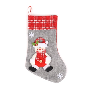 Linen Christmas stocking with 3D snowman mascot and festive red plaid cuff details