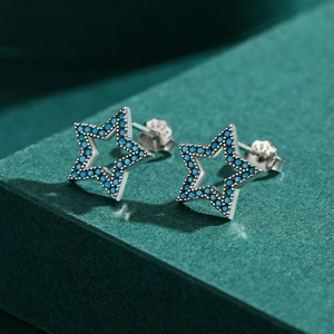 Boucles d'oreilles étoiles en argent 925 avec turquoise bleue pour un style chic quotidien