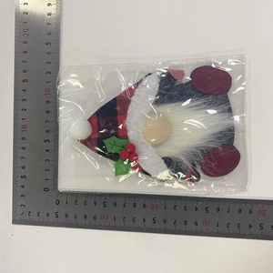 Christmas gnome utensil holder dimensions showing 14cm height and 11cm width in packaging