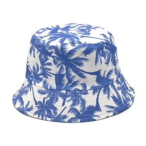 White bucket hat with blue palm tree print for summer travel and outdoor protection