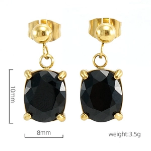Detail of gold oval earrings with black zircon stones showing size 10mm and 8mm dimensions