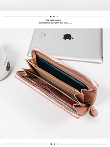 Detailed interior of pink long zipper purse showing multiple card slots and coin pocket