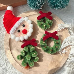 Handmade Christmas bow brooches and festive ornaments set in red and green colors