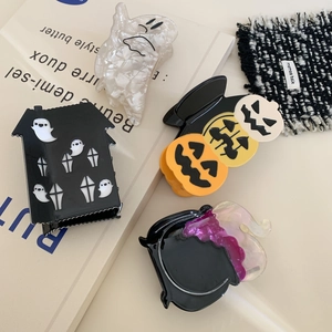 Halloween acetate hair claw set featuring spooky ghosts pumpkins and haunted house designs