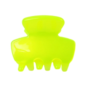 Detail view of a translucent yellow acetate hair claw clip on white background