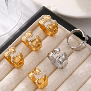 Irregular open ring set in 18k gold and silver stainless steel with crystal inlay