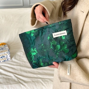 Vintage dark green jacquard clutch bag with a large capacity for travel and makeup storage