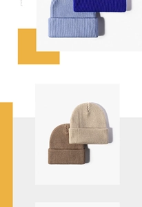 Detailed knit texture of four beanies in blue, beige and brown with vertical ribbing