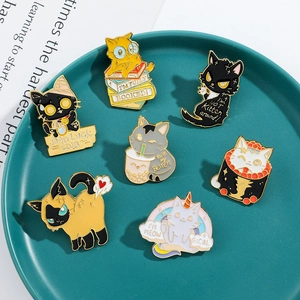 Set of 7 cartoon cat enamel pins featuring cute bubble tea and bookish designs