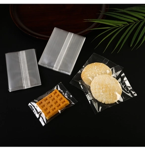 Close-up of food-grade transparent heat seal bags showcasing waffle and snack packaging