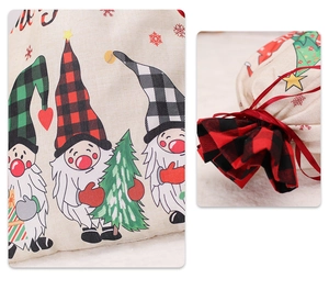 Detail of Christmas gnome drawstring gift bag with red cord and festive prints