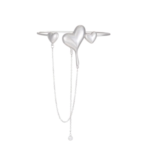 Silver liquid lava heart bracelet featuring long tassel chains and sparkling zircon stone