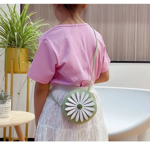 Girl's green round leather crossbody bag with large white daisy flower decoration
