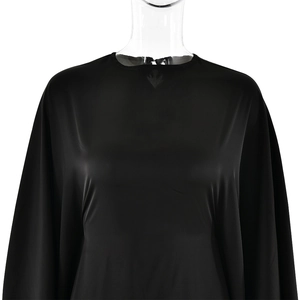 Detailed view of black satin batwing sleeve dress on a transparent mannequin
