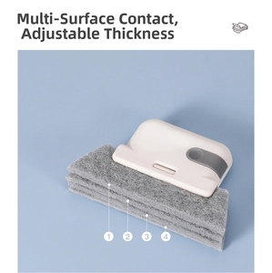 Close-up of a 2-in-1 window cleaning brush with a 4-layer adjustable scouring pad head