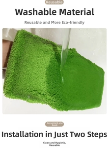 Close-up of a washable green microfiber mop pad being rinsed under running water
