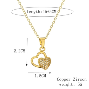 Detail of gold double heart necklace with copper zircon dimensions and material specs