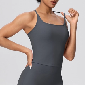 Detail shot of the gray-blue sports tank top showing thin straps and matte fabric texture