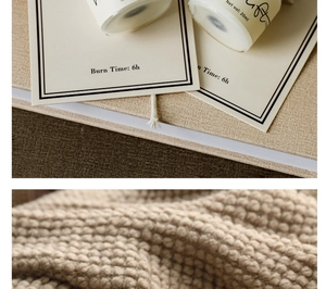 Close-up of 20ml travel scented candle with 6h burn time on soft knitted blanket