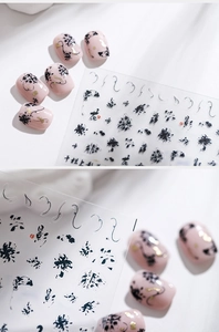 5D ultra-thin nail art stickers featuring black ink flowers and gold glitter accents